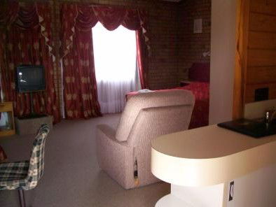 Spa Village Travel Inn - Accommodation QLD 4