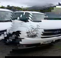 IMAX Private Transfer 7 Guests Cairns Airport to Palm Cove - Accommodation QLD