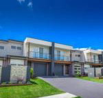 Escape at Nobbys Executive Townhouse 1 74 Pacific Drive - Accommodation QLD