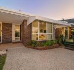 Woorim Secluded Palms Cottage - Accommodation QLD