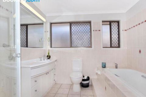 Schirrmann 56 Four Bedroom Home On Canal With Pool Pontoon Aircon & WiFi! - Accommodation QLD 0