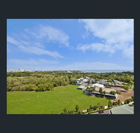 Nomikis'On The Avenue - Accommodation QLD