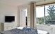 BRIGHT And Airy TOP FLOOR Apartment With FAB Views - thumb 1