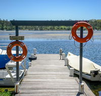 Calm Waters Waterfront Cottages - Accommodation QLD