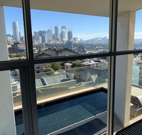 Darlinghurst Spacious apartment with balcony and pool with harbour views - Accommodation QLD