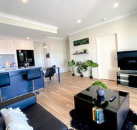 Elegantly Appointed BRAND NEW Luxurious Apartment - Accommodation QLD