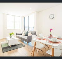 Gorgeous modern brand new two bedroom apartment with large lounge and private garden view balcony - Accommodation QLD