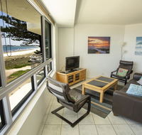 Oceanside Resort - Absolute Beachfront Apartments - Accommodation QLD