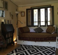 Redhaus Artist Cottage - Accommodation QLD