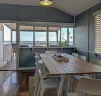 Sublime Beachfront Queenslander on the Esplanade - Accommodation QLD