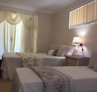 Theme Parks Amituofo Guest House - Accommodation QLD