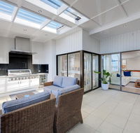 Whispering Sands' 10 Sandy Point Road - Luxury waterfront home with aircon WIFI  Foxtel - Accommodation QLD