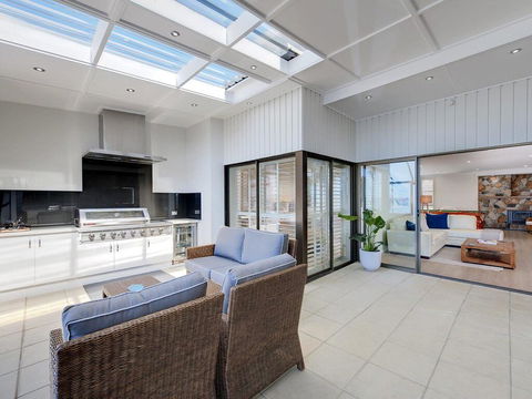 Whispering Sands', 10 Sandy Point Road - Luxury Waterfront Home With Aircon, WIFI & Foxtel - Accommodation QLD 0
