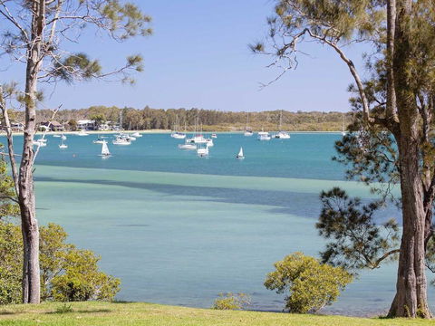 'Corlette Waterfront', 2/44 Danalene Parade - Waterfront Luxury, WIFI, Aircon, Boat Parking - Accommodation QLD 0