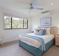 'Sandy Point Haven' 21a Sandy Point Rd - Stylish Haven with WIFI Air conditioning  Water views - Accommodation QLD