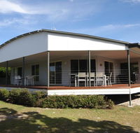 14 Zircon Street - Centrally located family home with covered deck close to patrolled beach  shops - Accommodation QLD