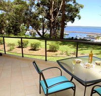 2 'Magnus Pines' 52-56 Magnus Street - stunning unit with aircon water views  foxtel - Accommodation QLD