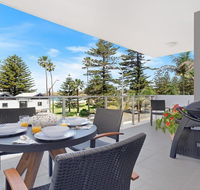 Bathers at the Beach - across from Surf Beach - Accommodation QLD