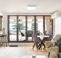 Beachfront Manly Apartment With Parking and Balcony - Accommodation QLD